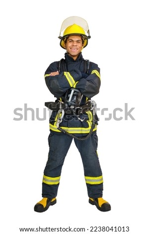 Full body young smiling African American fireman with crossed arms wearing yellow helmet and fireproof uniform, isolated on white background