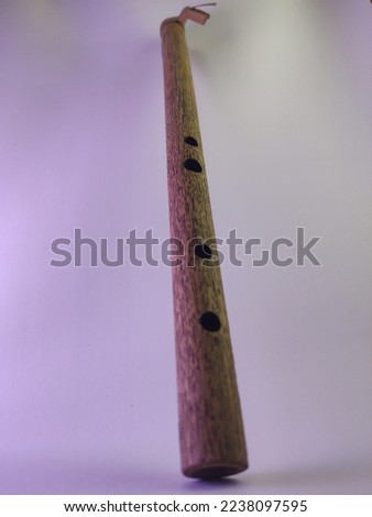 a traditional musical instrument from West Java, namely the bamboo flute made of small dry bamboo which is perforated to produce the basic note g