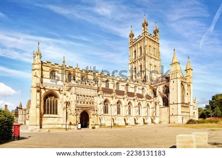 View of Gloucester Cathedral Church of St Peter and the Holy and Indivisible Trinity on a sunny day. Copy space in sky. Royalty-Free Stock Photo #2238131183