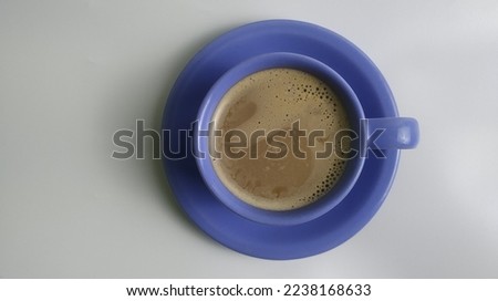 A Cup of white coffee. Perfect for culinary blog banner or picture in a news website
