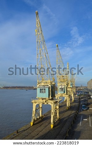 Historical cranes became part of the mas museum exhibition in belgian antwerp. Royalty-Free Stock Photo #223818019