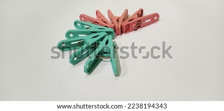 Clothespin on a white background. Different colors of clothespins.