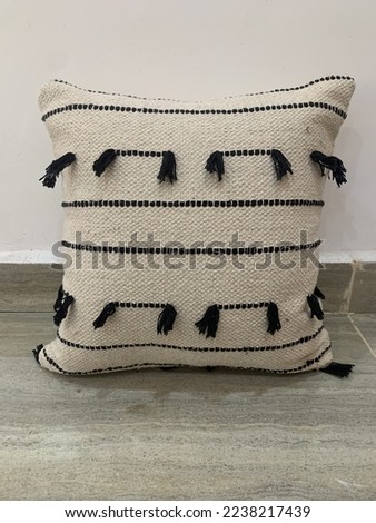Hand woven cotton shaggy cushion cover.