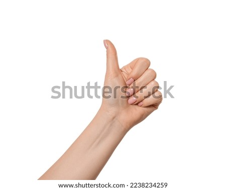 Female hand like, thumbs up, isolate Royalty-Free Stock Photo #2238234259