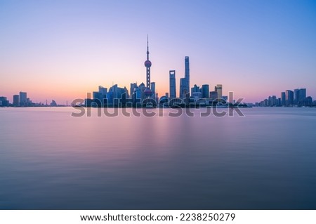 skyline of Shanghai financial district buildings, and Huangpu river in the morning