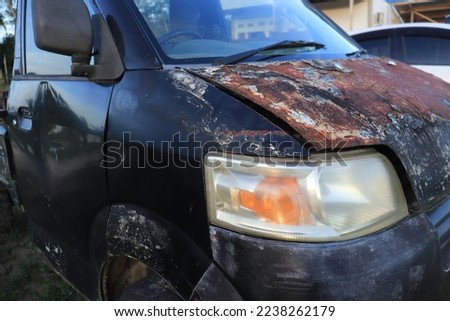 Old rusty black pickup truck