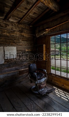 Old barber chair in Bannack State Park stock photo
