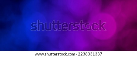 Abstract blue and pink modern background banner with bokeh lights effect in the dark