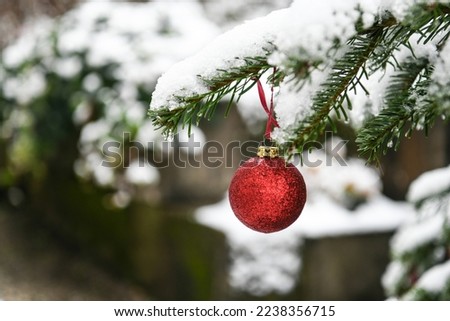 Snowy Christmas tree and ornaments