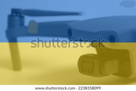 Double exposure of Flag of Ukraine and quadcopter drone aerial camera.