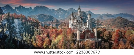 Tipical postcard. Majestic Neuschwanstein castle during sunset, with colorful clouds under sunlight. Dramatik Picturesque scene. fairytale Castle near Munich in Bavaria, Germany. Natural Landscape. Royalty-Free Stock Photo #2238389679