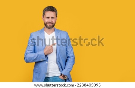 businessperson wearing formal jacket pointing finger. caucasian businessperson in jacket
