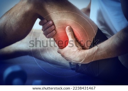 Detail of a representation of pain in the hamstrings with red color on a bluish image. Royalty-Free Stock Photo #2238431467