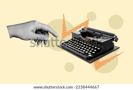 Creative arm typing on retro typewriter