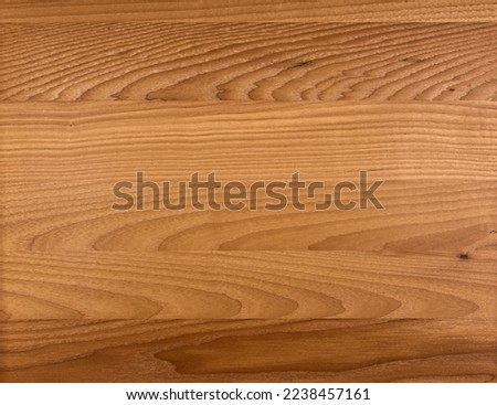 Brown Beige Texture of stained oak wood with grain, fragment of a wooden panel hardwood. surface bark is used as natural background, web page, board, table. Contrasts and symmetries. Space for text.