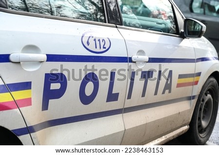 Police patrol car in Romania. Side view of a police car with the lettering "Police".