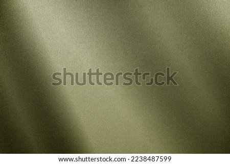 Green brown silk satin. Gradient. Olive color. Luxury elegant abstract background for design, text. Light dark shade. Matte, shimmer. Curtain. Drapery. Fabric, cloth texture.  Royalty-Free Stock Photo #2238487599