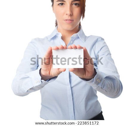 Young beautiful business woman over white background. Holding a white card with both hands