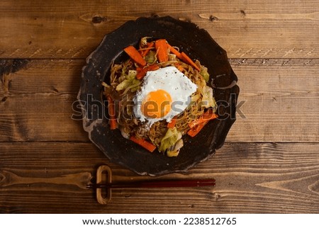 Fried Noodles with Fried Eggs and Sauce