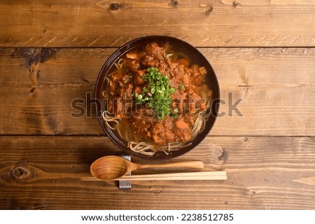 Curry served over hot dashi soba noodles