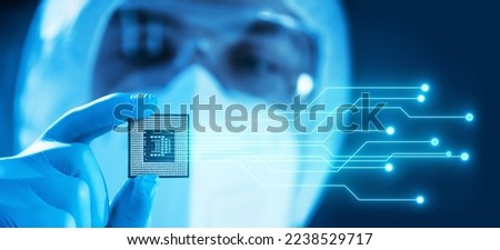 Close-up of Professional Scientist Holding a Modern Microprocessor Chip in Hand. Scientific Laboratory, Research and Development of Microelectronics and Processors. Computer Technology and Equipment. Royalty-Free Stock Photo #2238529717