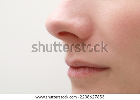 Woman with dry skin on white background, closeup of mouth Royalty-Free Stock Photo #2238627653
