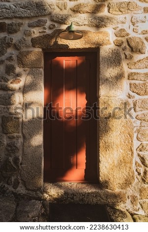 Traditional door lock made of timber in the old village of Aldeia de Trebilhadouro, Vale de Cambra, Aveiro, Portugal Royalty-Free Stock Photo #2238630413