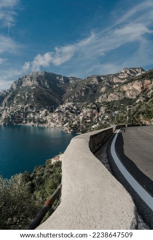 The Amalfi Coast road with Positano in the background. 