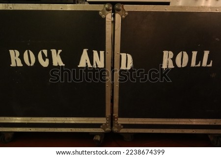 Rock and Roll lettering on two trunks for transporting musical instruments