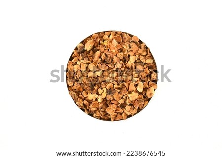 organic dried apple chips on white background high res stock images. dehydrated apple pieces. coarse cuts.top view. sweet preserved fruits. sweet natural flakes. 