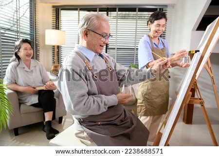 Group of Asian senior people are enjoy  painting at elderly healthcare center, elder group therapy concept
 Royalty-Free Stock Photo #2238688571