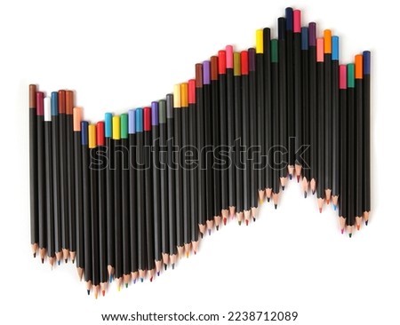 Colored pencils lined up on white background. Color pencils isolated on white. Copy space. 