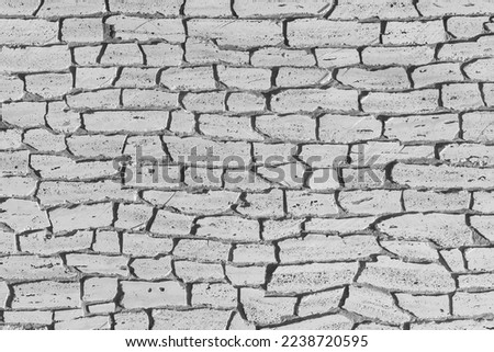 Light white grey stone brick wall, modern texture masonry pattern background abstract.