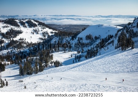 View from the top of the Summit chairlift at Alpine Meadows, now part of Alterra's Palisades Tahoe property, which also includes Olympic Valley. Royalty-Free Stock Photo #2238723255