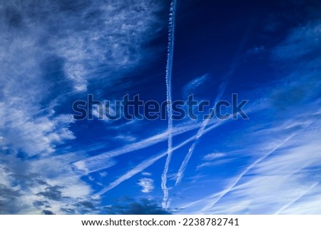 Abstract colorful picture of sky with chemtrails