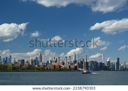 Manhattan skyline and the East River from Williamsburg, Brooklyn, New York City, USA