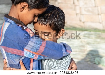 orphan children comforting each other in the time of crisis
