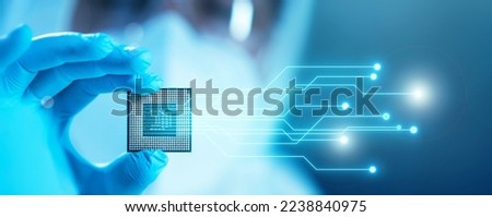 Close-up of Professional Scientist Holding a Modern Microprocessor Chip in Hand. Scientific Laboratory, Research and Development of Microelectronics and Processors. Computer Technology and Equipment. Royalty-Free Stock Photo #2238840975