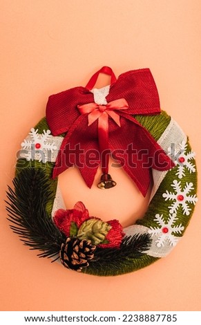 Beautiful Christmas wreath with red bow. Handmade for Christmas