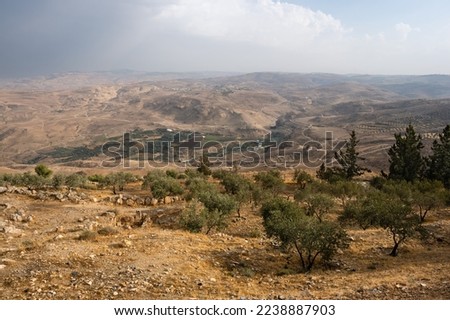 Mount Nebo Landscape with Khirbet al-Mukhayyat Village in Jordan with Olive Trees Royalty-Free Stock Photo #2238887903