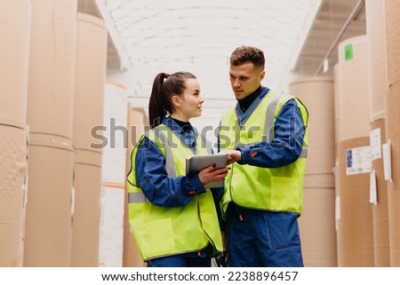 Paper mill factory workers. High quality photo Royalty-Free Stock Photo #2238896457