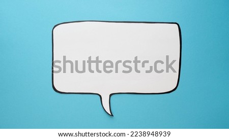 Speech bubble on a blue background. Comic cloud with a place for text Royalty-Free Stock Photo #2238948939