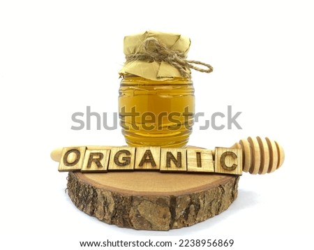 Organic and Raw Honey Bee Issues, Vintage unique Bottle Glass Packaging designs ideas. Properties, organic acid, formic, acetic, gluconic, trehalose structure, enzyme invertase, diastase, diseases Royalty-Free Stock Photo #2238956869