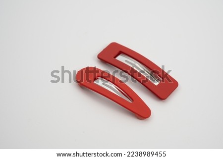 set of two red hair grips slides styles isolated on a white background Royalty-Free Stock Photo #2238989455