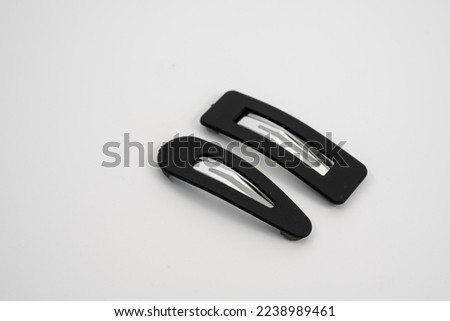 set of two black hair grips slides styles isolated on a white background Royalty-Free Stock Photo #2238989461