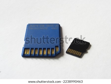 Storage of memory cards of different types and sizes. On a white background.                               
