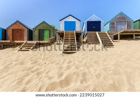 Beach Huts on Abersoch beach in North Wales UK Royalty-Free Stock Photo #2239015027