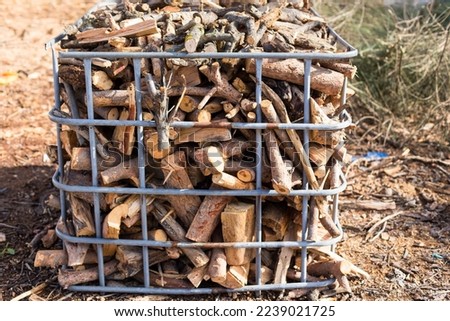 Wood for heating packed in an iron  crate