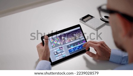 Video Editor Or Designer Using Editing Software Tech On Tablet