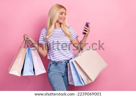 Photo of adorable lady use look telephone menu gadget make order courier delivery isolated on pink color background